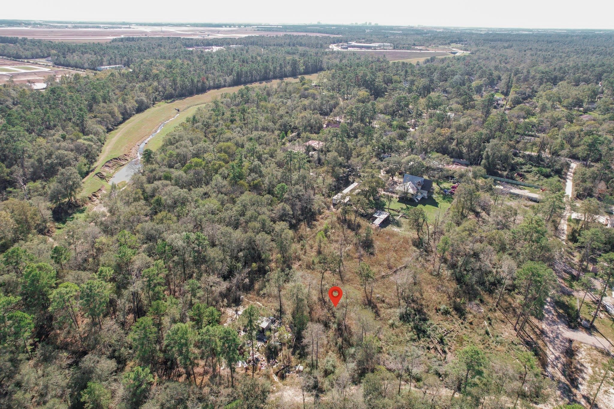 21414 Countryside Lane Humble, TX 77338 - Photo 2 of 5 an aerial view of houses with yard