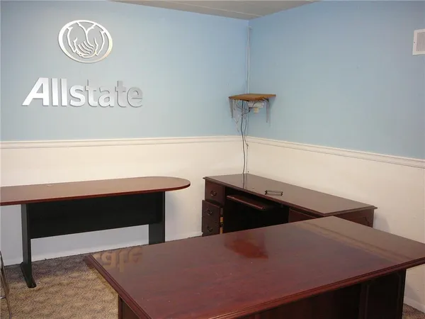 a bedroom with a bed and a table