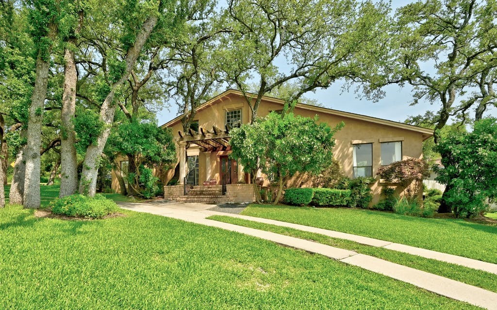 a garden view with a seating space