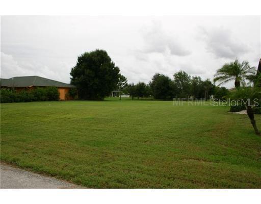 1415 Neapolitan Road Punta Gorda, FL 33983 - Photo 1 of 1 Exterior Front - Nestled between beautiful homes this lot with water and sewer is ready for you Florida dream Home