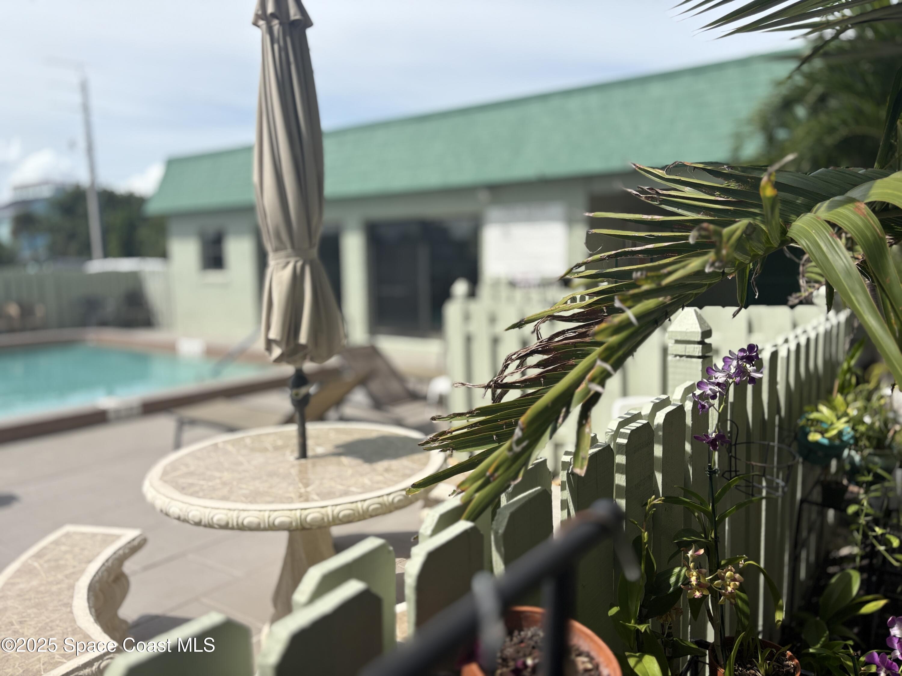 Undisclosed Address Cocoa Beach, FL 32931 - Photo 13 of 17 a bathroom with a sink and mirror