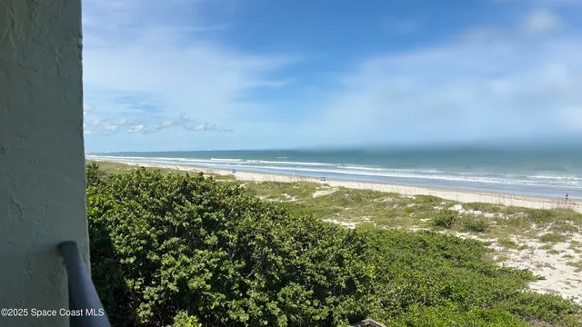a view of a large window with an outdoor space