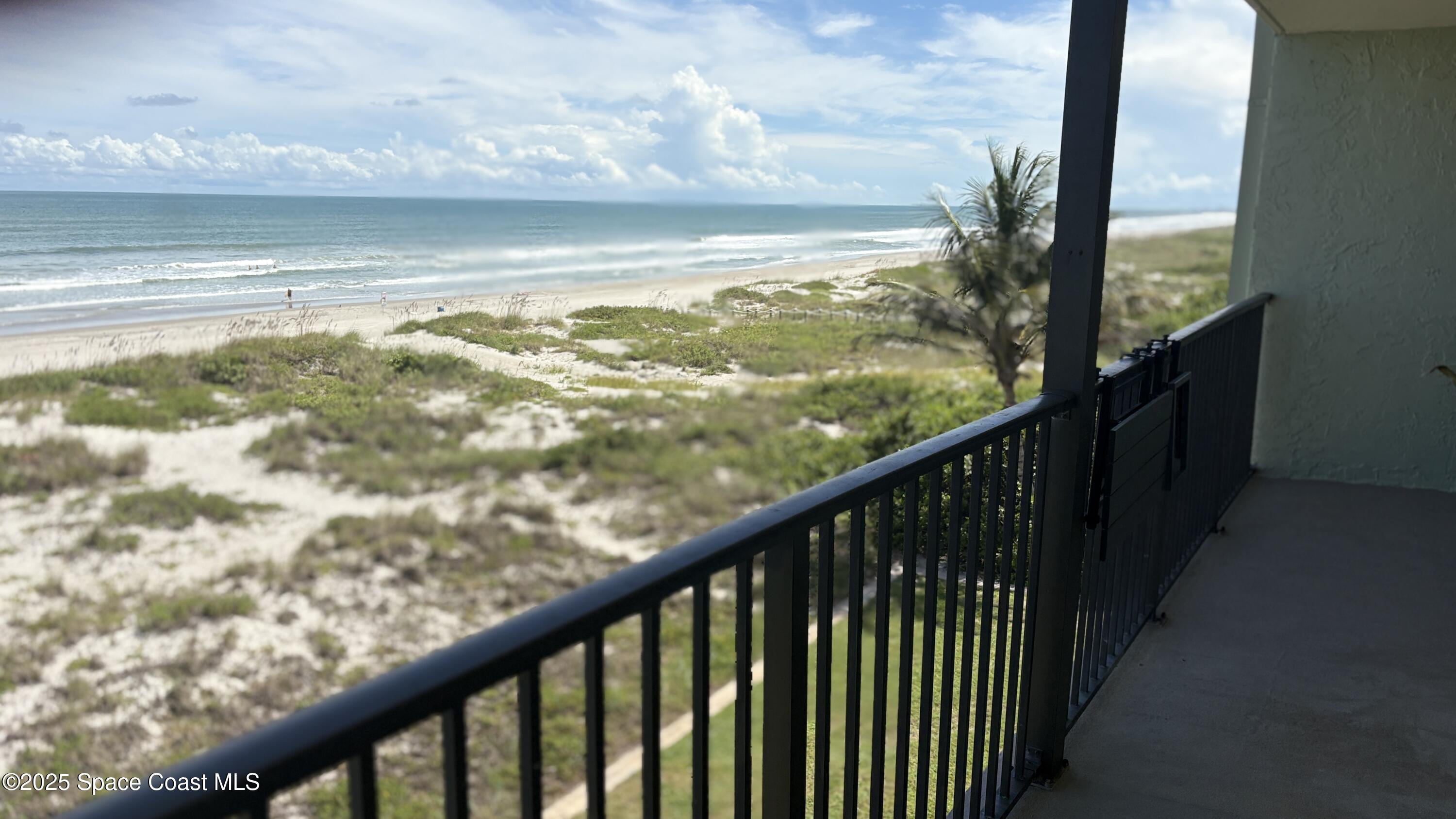 Undisclosed Address Cocoa Beach, FL 32931 - Photo 17 of 17 a view of a balcony with an ocean view