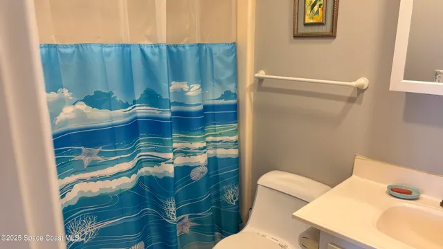 a bathroom with a sink and a toilet