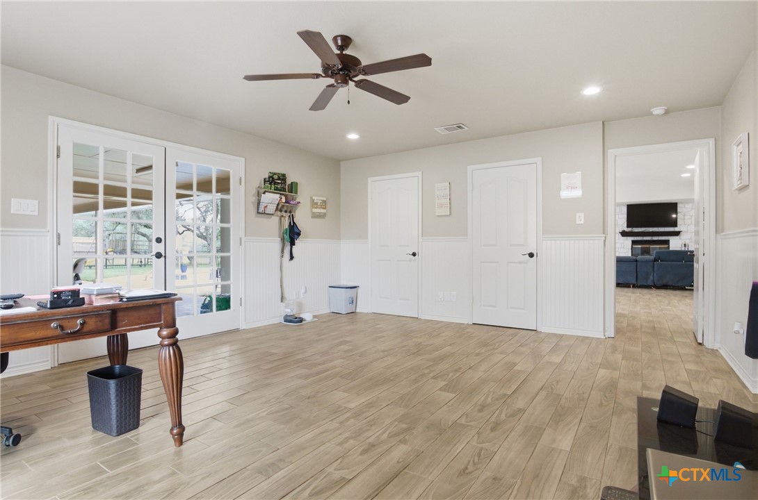642 Phantom Rider Trail Spring Branch, TX 78070 - Photo 20 of 41 a view of a livingroom with furniture and a ceiling fan