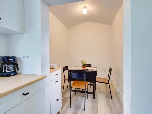 a view of a workspace with furniture