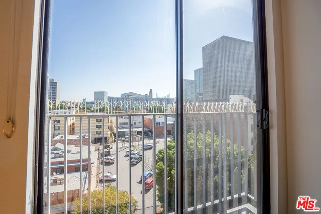 a view of a balcony with city view