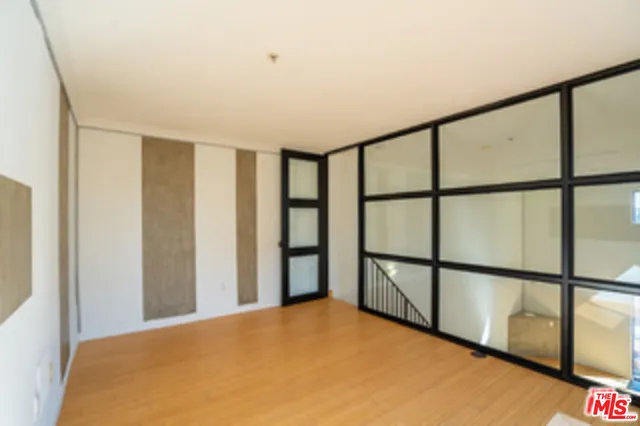 a view of a room with a large window