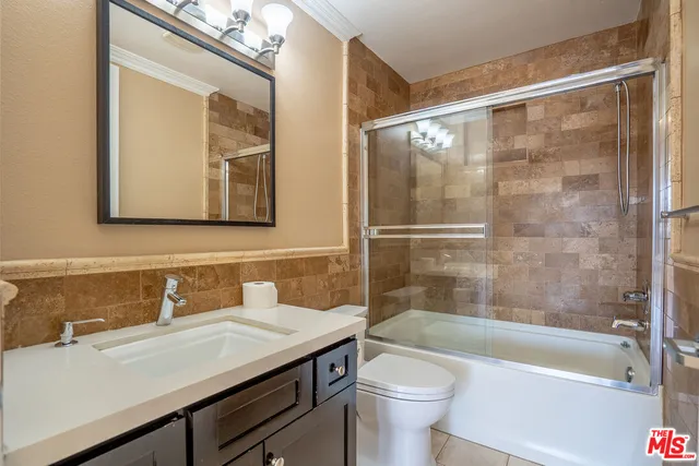 a bathroom with a sink and a bathtub