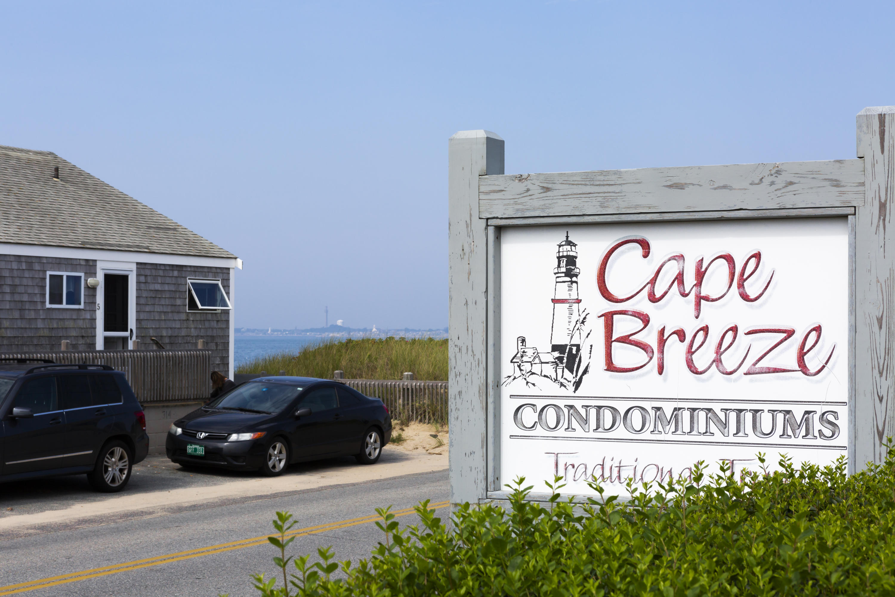 307 Shore Road, Unit 9 & SB2 Truro, MA 02666 - Photo 13 of 13 a sign that is on the wall of building