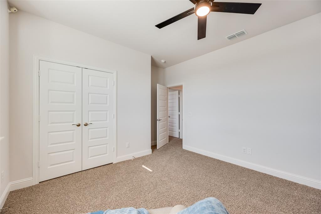 561 Randys Way Pilot Point, TX 76258 - Photo 22 of 34 an empty room with fan