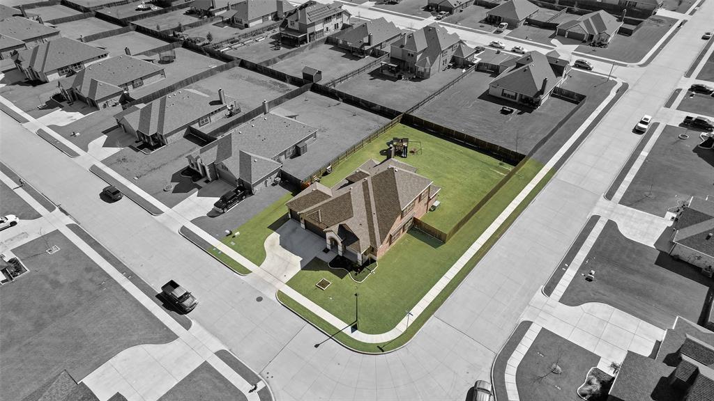 561 Randys Way Pilot Point, TX 76258 - Photo 34 of 34 an aerial view of a residential apartment building with swimming pool