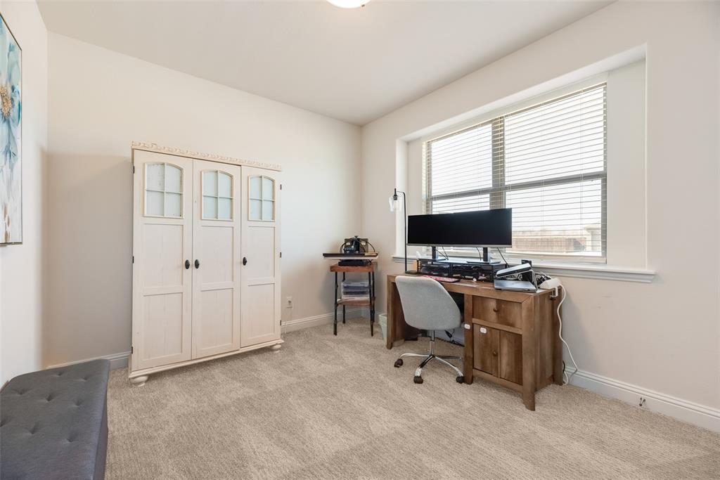 561 Randys Way Pilot Point, TX 76258 - Photo 9 of 34 a view of a workspace with furniture and a window