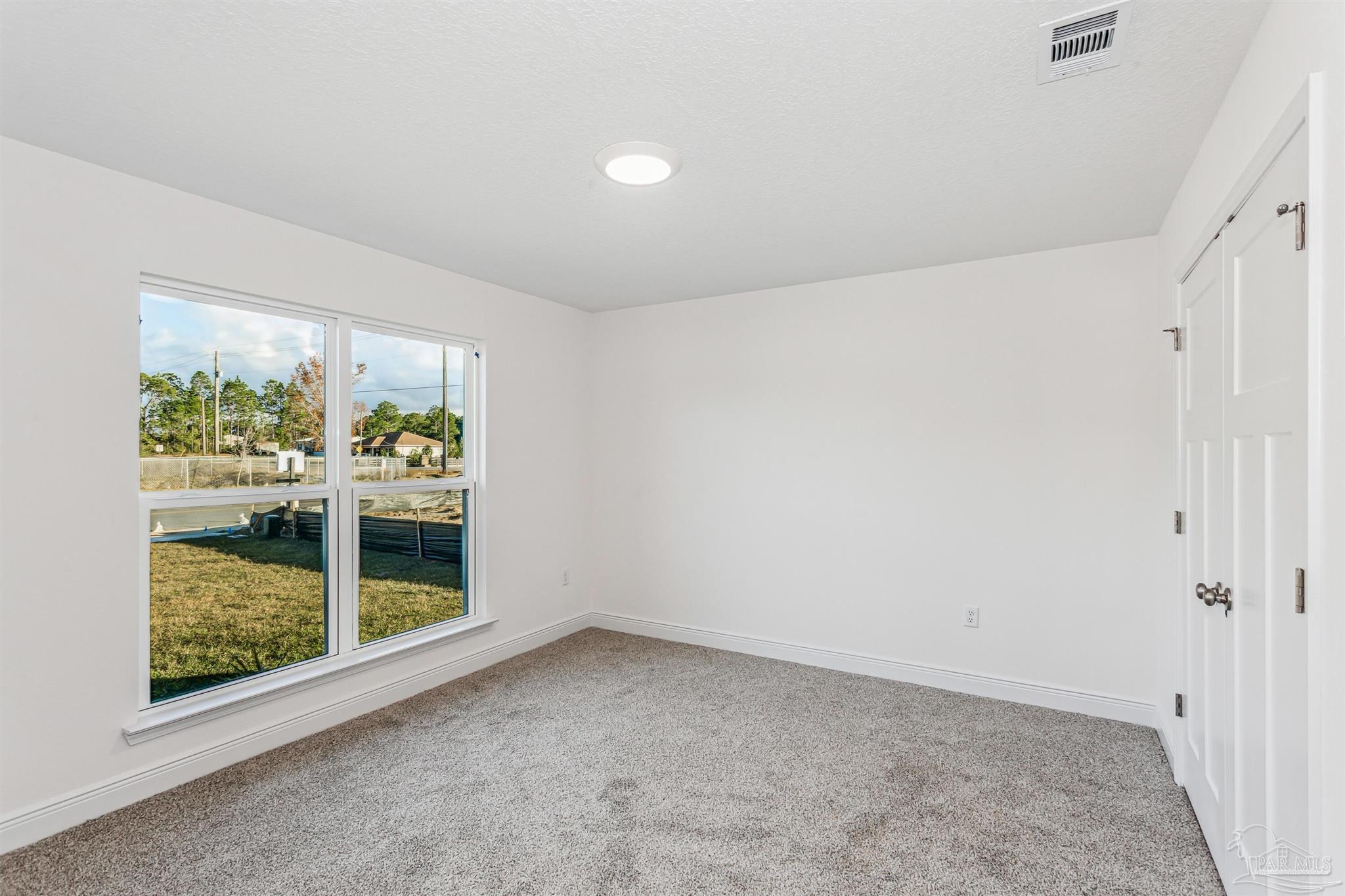5009 Rainwater Road Milton, FL 32583 - Photo 13 of 29 a view of room and window