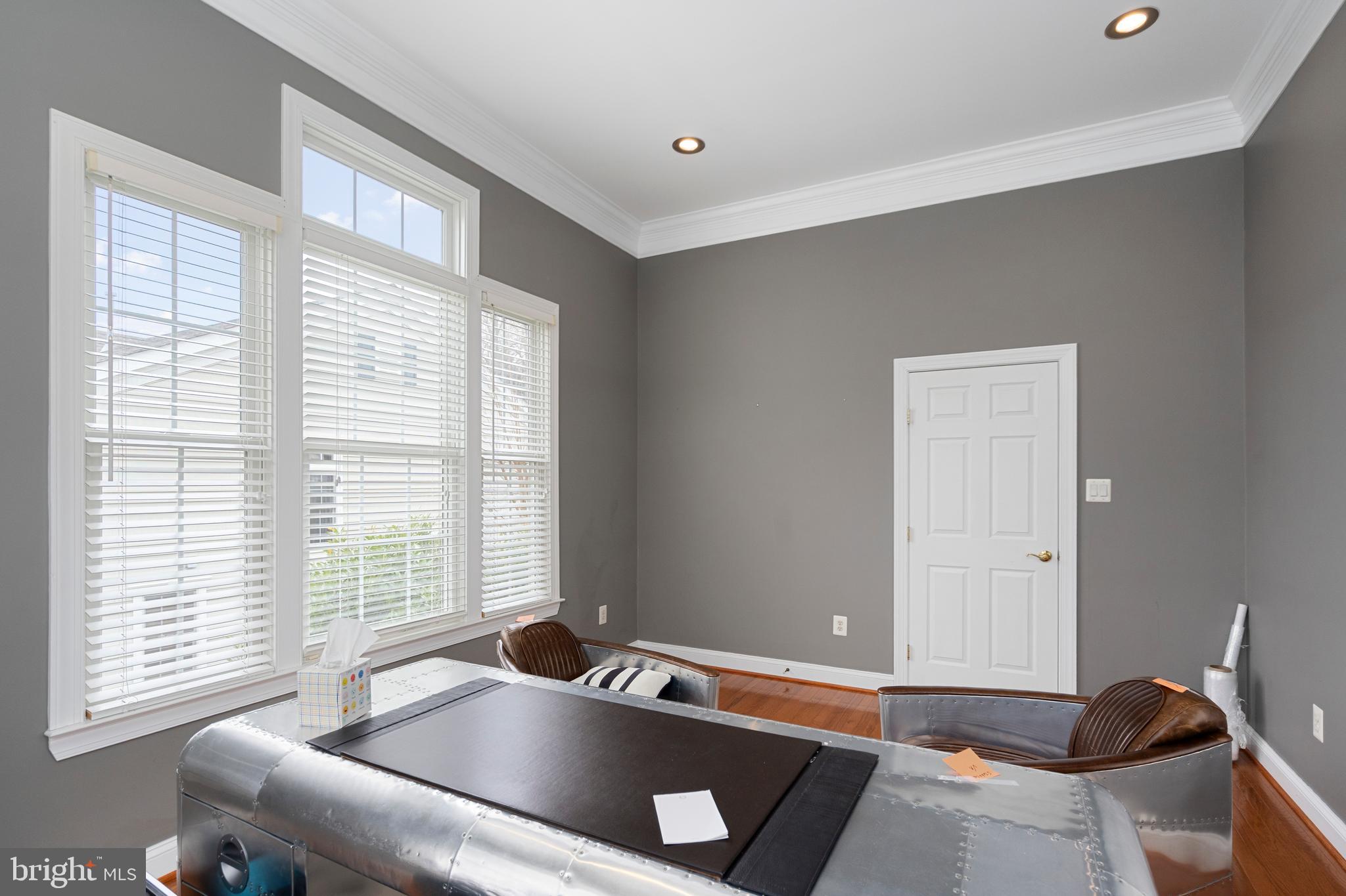 818 Hidden Bluff Circle Catonsville, MD 21228 - Photo 13 of 36 a living room with a couch and a window