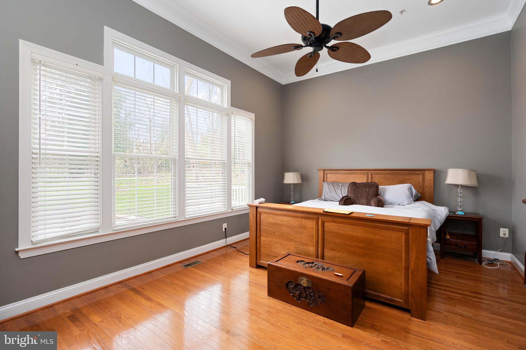 818 Hidden Bluff Circle Catonsville, MD 21228 - Photo 15 of 36 a living room with a bed furniture and a large window