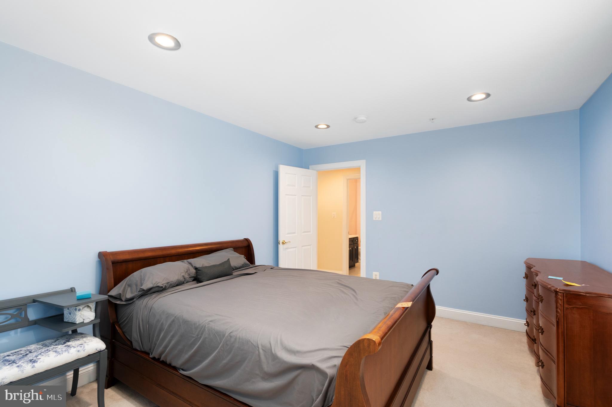 818 Hidden Bluff Circle Catonsville, MD 21228 - Photo 20 of 36 a bedroom with a bed and a window