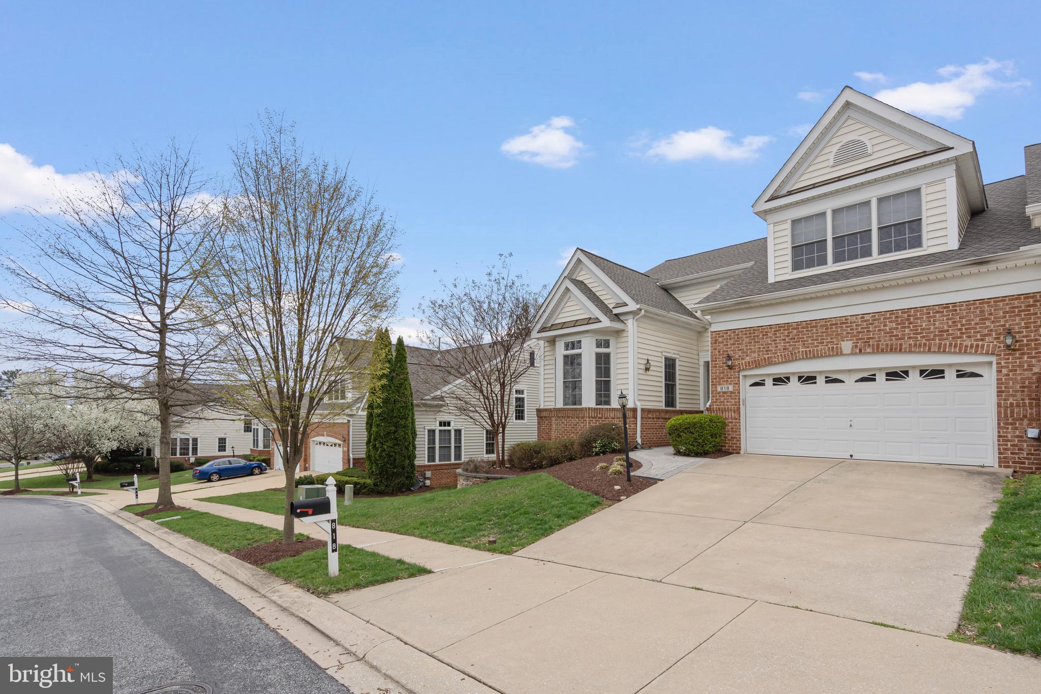 818 Hidden Bluff Circle Catonsville, MD 21228 - Photo 2 of 36 a front view of a house with a yard and garage