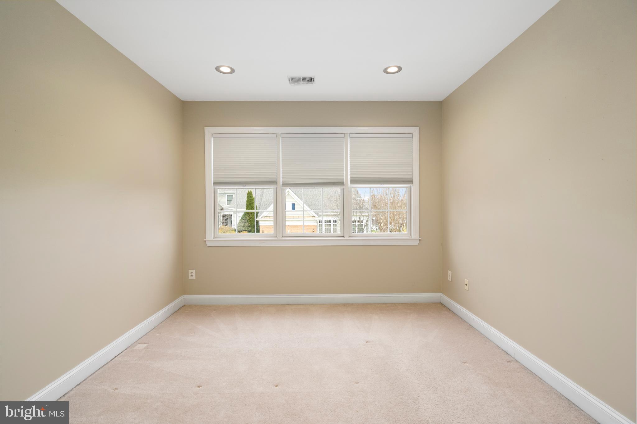 818 Hidden Bluff Circle Catonsville, MD 21228 - Photo 22 of 36 an empty room with a window