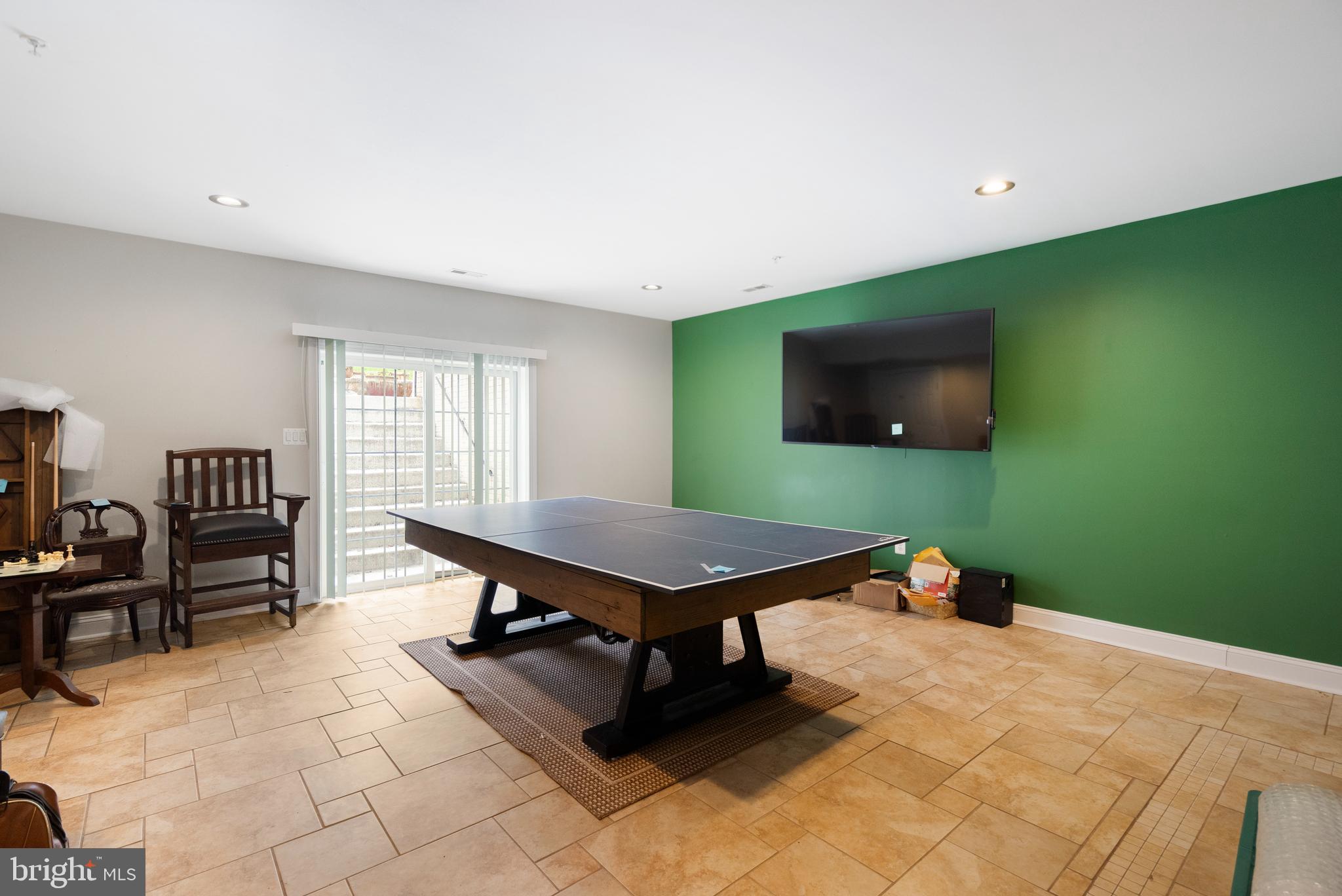 818 Hidden Bluff Circle Catonsville, MD 21228 - Photo 26 of 36 a living room with furniture pool table and flat screen tv
