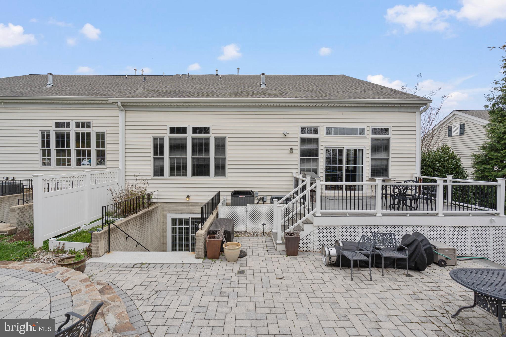 818 Hidden Bluff Circle Catonsville, MD 21228 - Photo 34 of 36 a front view of a house with patio
