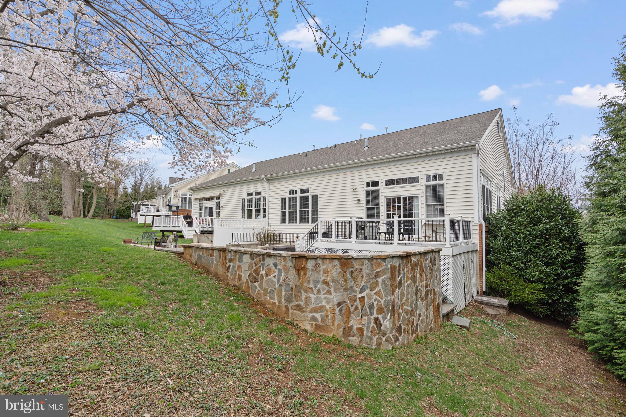 818 Hidden Bluff Circle Catonsville, MD 21228 - Photo 35 of 36 a front view of a house with garden