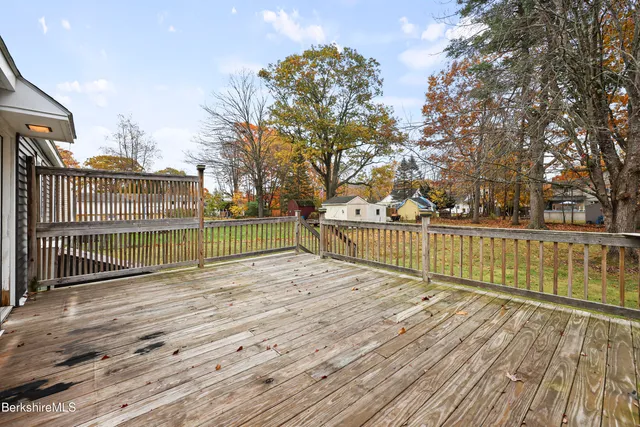 a view of street with a small yard