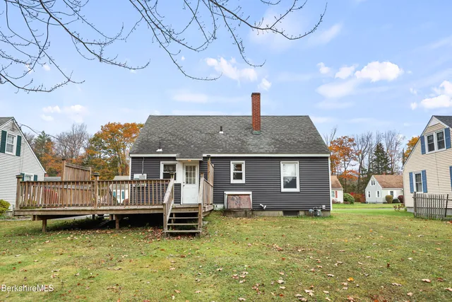 a house view with a garden space