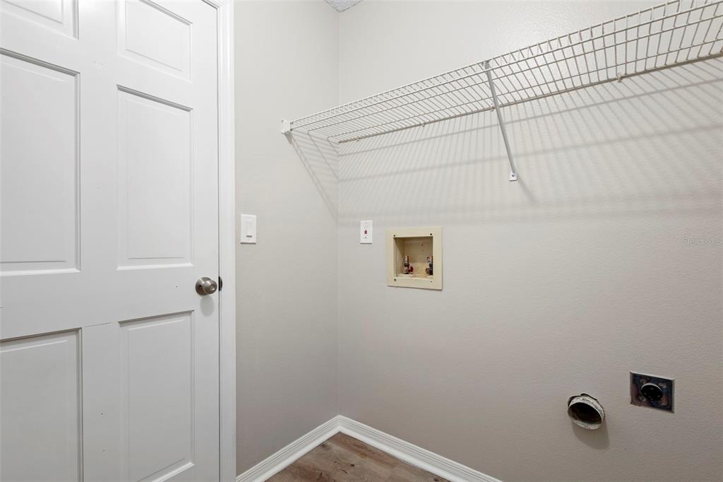 1031 Abeline Drive Deltona, FL 32725 - Photo 24 of 37 a view of a bathroom with a shower