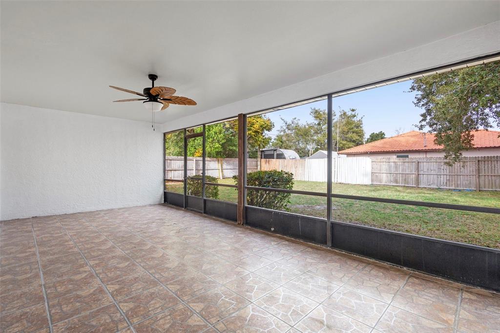 1031 Abeline Drive Deltona, FL 32725 - Photo 34 of 37 a view of a yard and porch