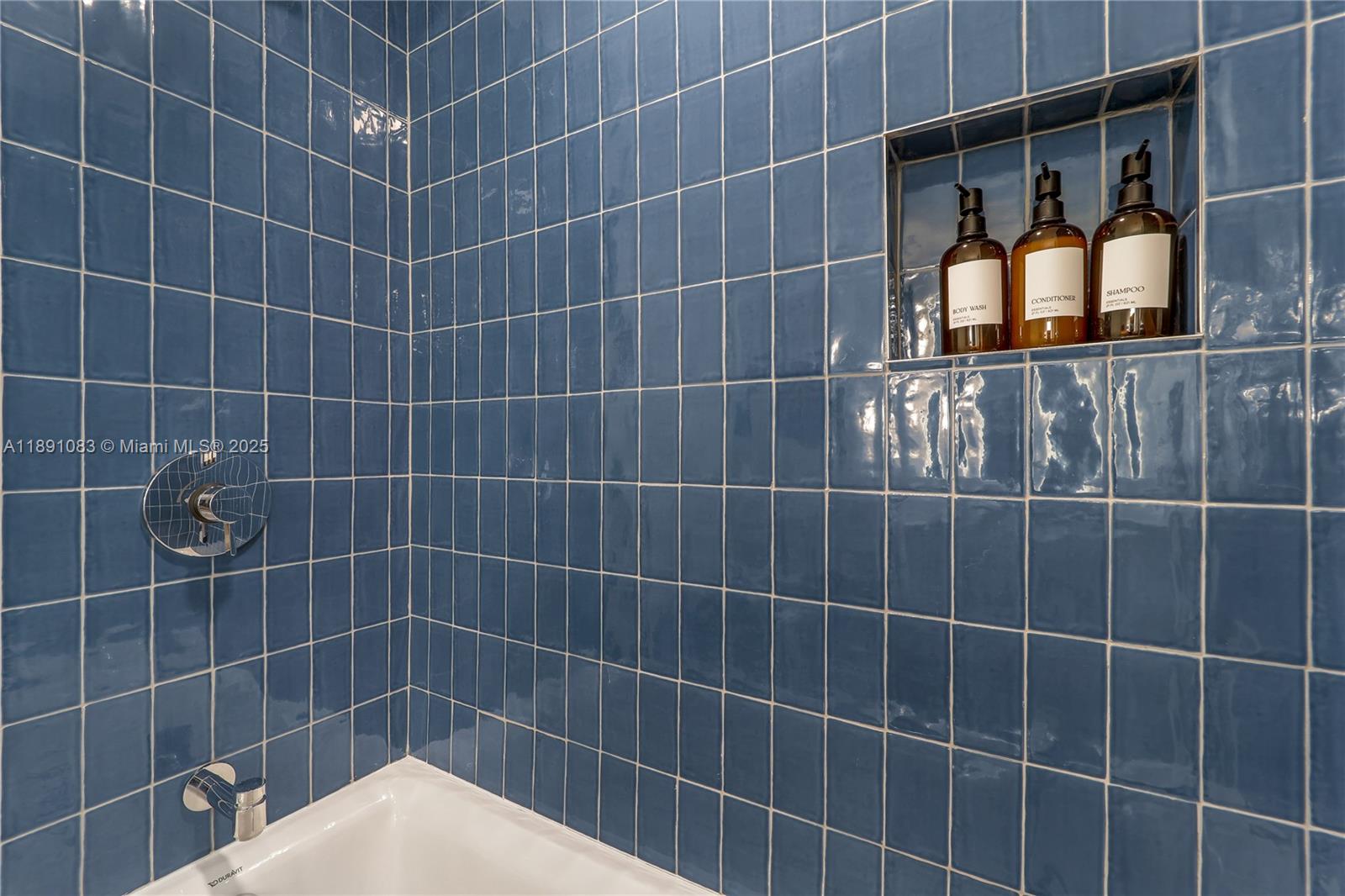 601 Northeast 1st Avenue, Unit 1619 Miami, FL 33132 - Photo 4 of 17 a bathroom with a shower