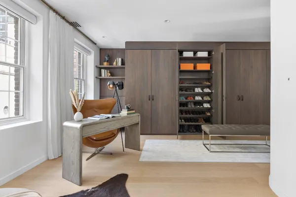 a workspace with furniture and window