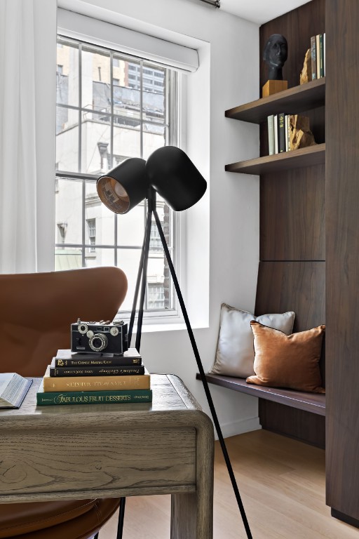128 East 38th Street, Unit 1 Manhattan, NY 10016 - Photo 16 of 27 a reading room with furniture and a book shelf