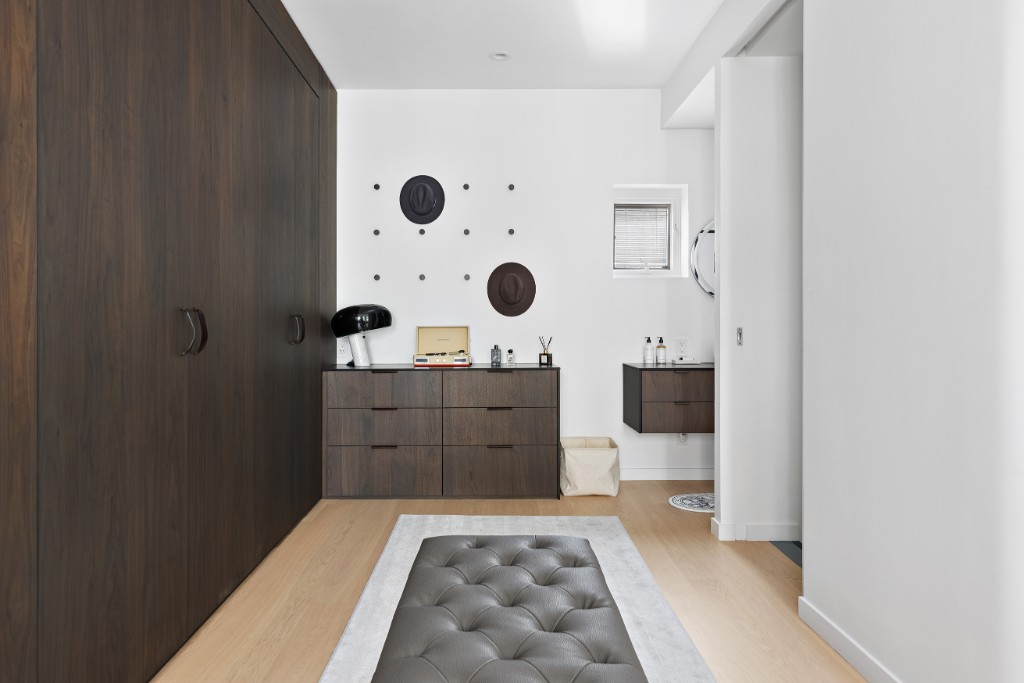 128 East 38th Street, Unit 1 Manhattan, NY 10016 - Photo 17 of 27 a bedroom with a large bed and a dresser