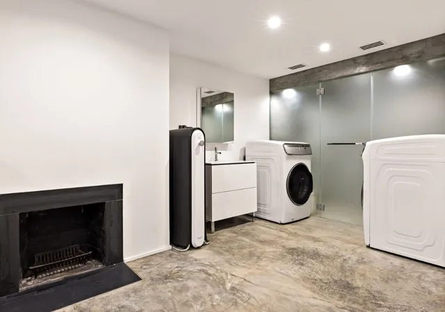 a utility room with dryer and washer