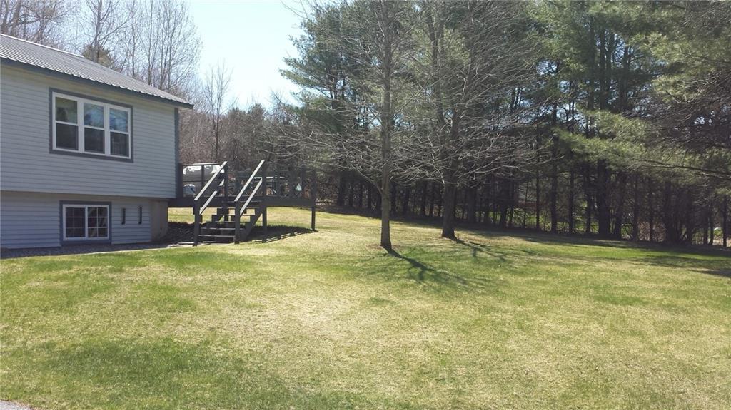 118 Hebron Road Buckfield, ME 04220 - Photo 2 of 29 Well established lawn, trees and shrubs.