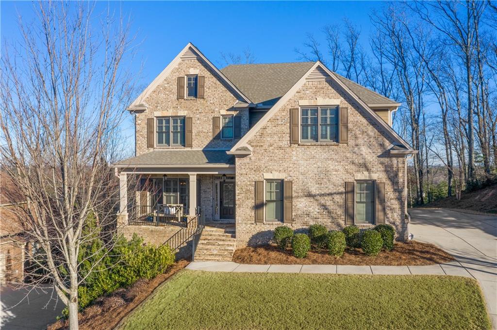 Perched atop a gently cresting hill in Summit at Piedmont, a highly sought after community, this brick and stone craftsman is truly move in perfect!