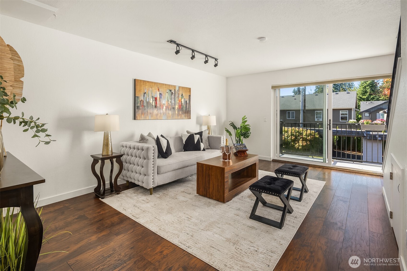 8603 244th Street Southwest, Unit 2D Edmonds, WA 98026 - Photo 12 of 21 a living room with furniture and a large window