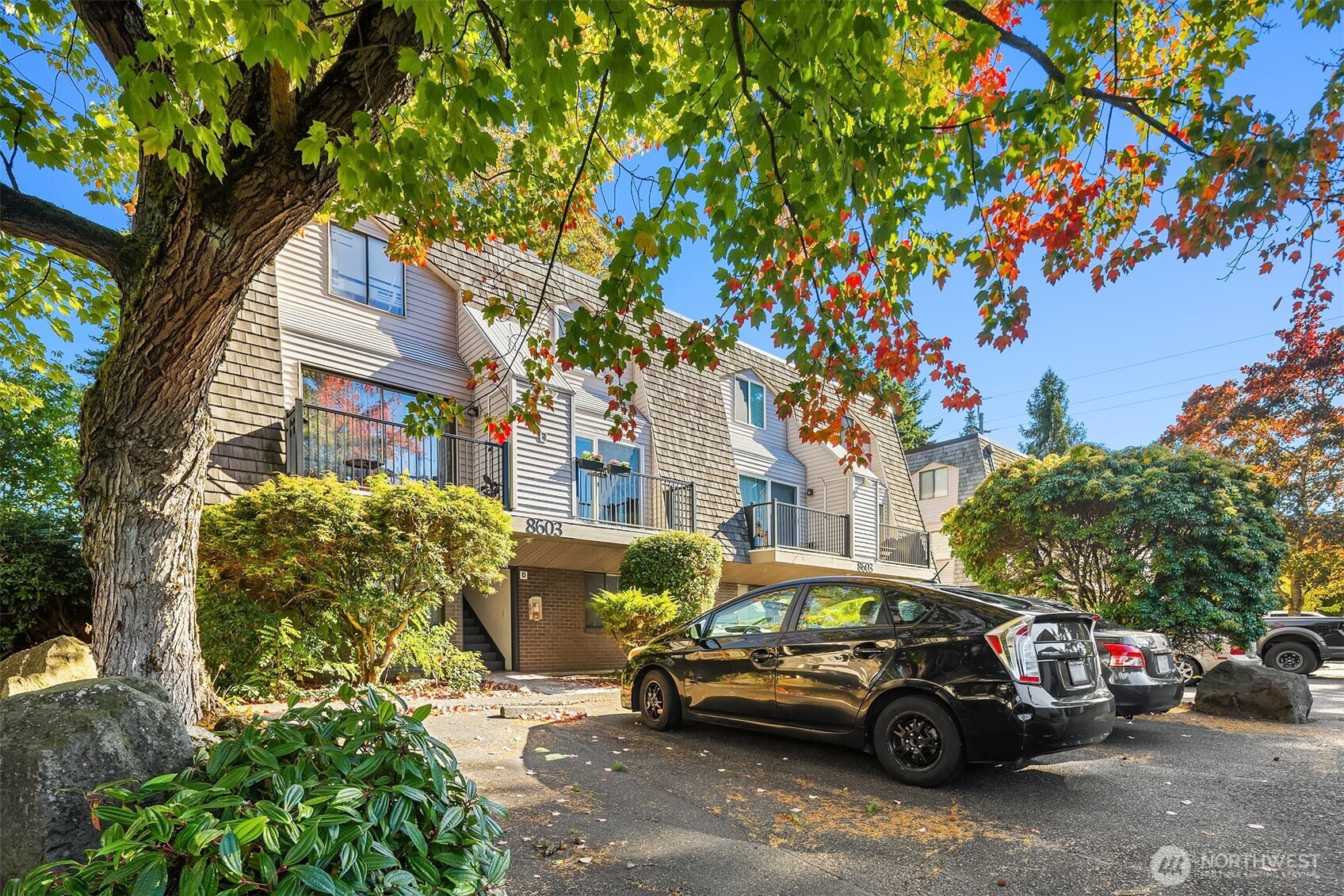 8603 244th Street Southwest, Unit 2D Edmonds, WA 98026 - Photo 21 of 21 a car parked in front of a house