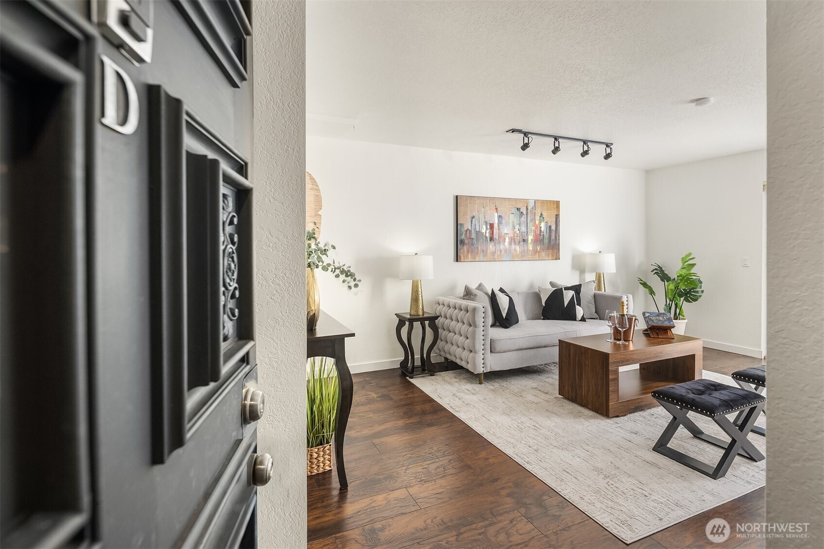 8603 244th Street Southwest, Unit 2D Edmonds, WA 98026 - Photo 4 of 21 a living room with furniture and a window