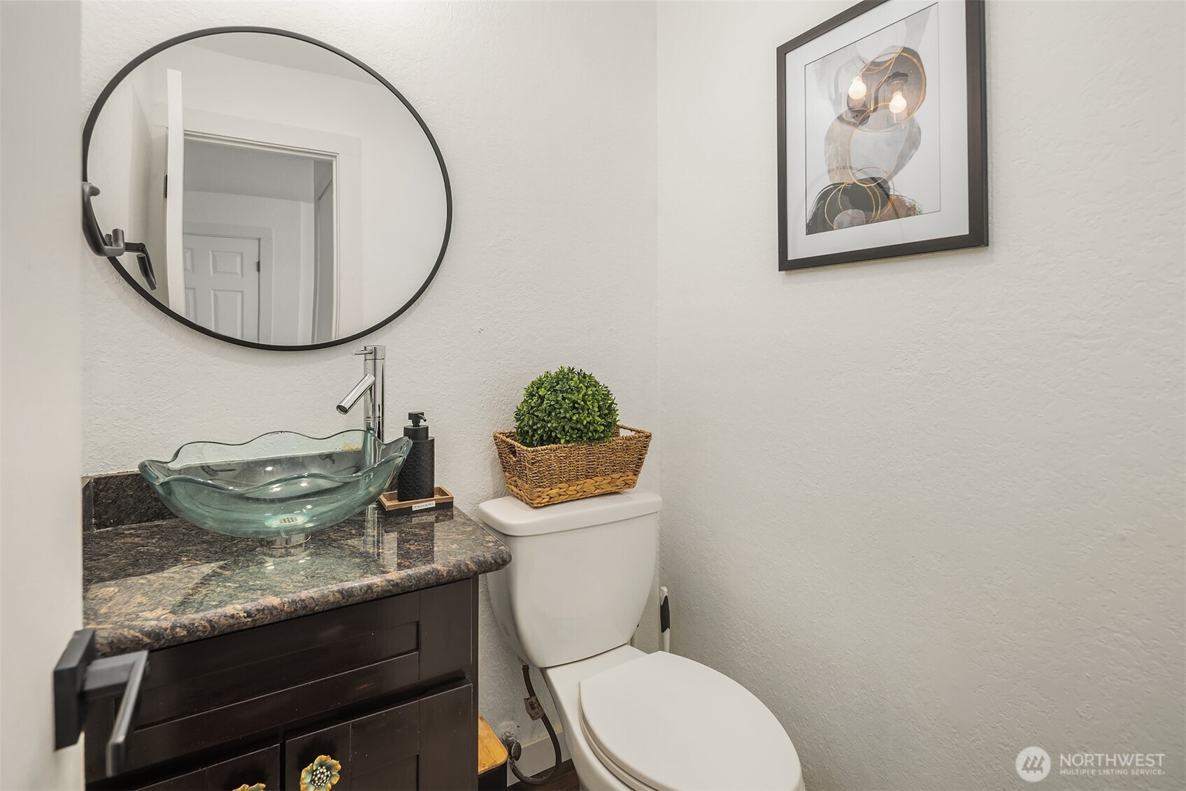 8603 244th Street Southwest, Unit 2D Edmonds, WA 98026 - Photo 10 of 21 a bathroom with a toilet a sink and a mirror