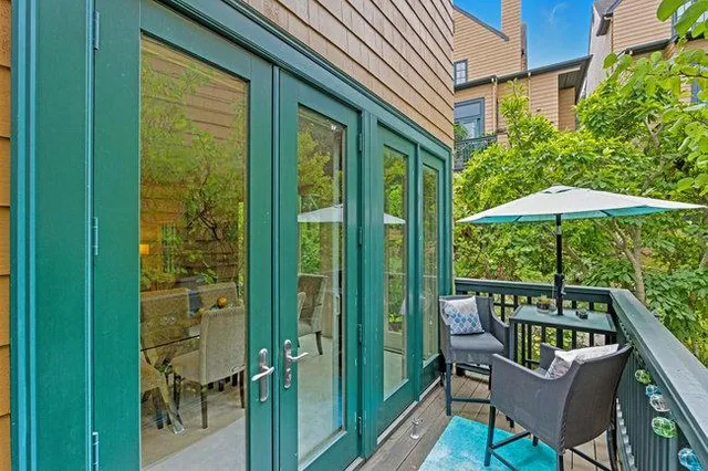 a view of balcony with furniture