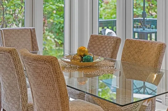 a kitchen with a table and chairs in it