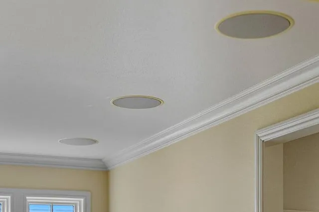 a view of walk in closet with clothes