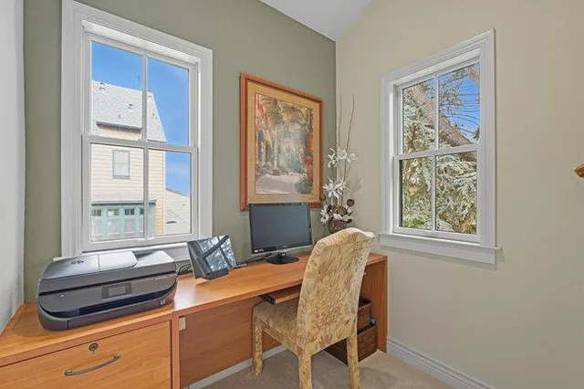 a kitchen with sink and a window
