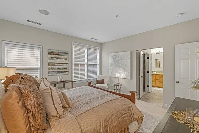 a bed room with a bed and gym equipment