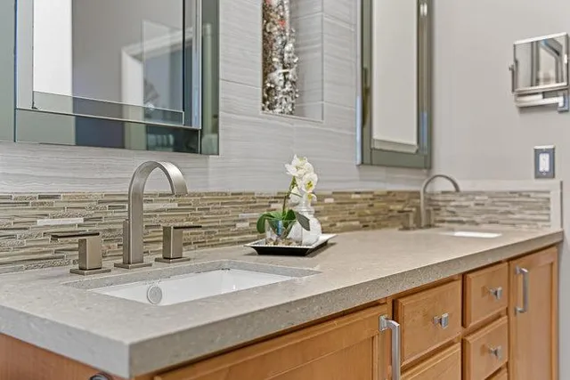 a house that has a tree in front of it