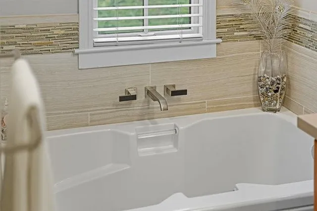 a view of a house with a tree