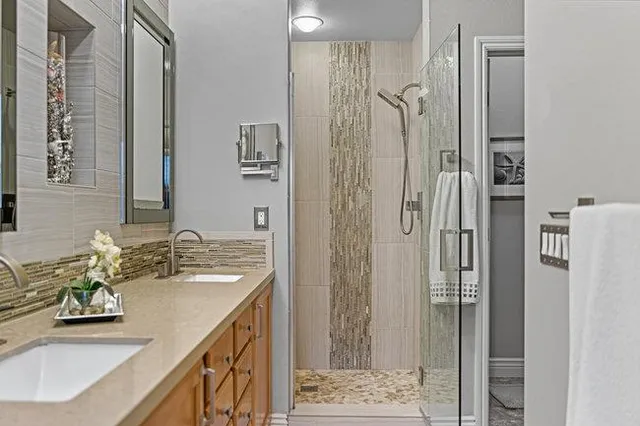 a view of a house with a tree