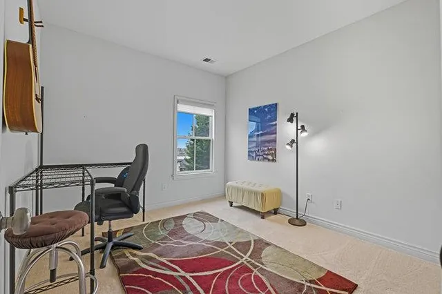 an aerial view of a house with a garden
